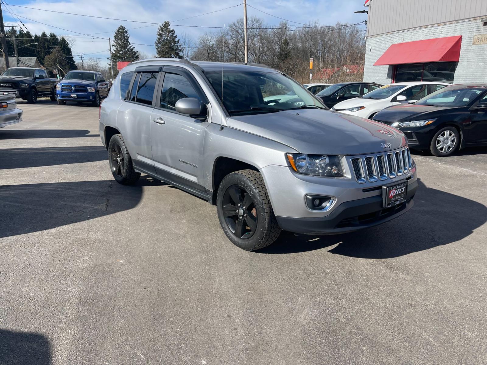 2015 Silver /Black Jeep Compass High Altitude 4WD (1C4NJDEB0FD) with an 2.4L I4 DOHC 16V engine, 6 Speed Automatic transmission, located at 547 E. Main St., Orwell, OH, 44076, (440) 437-5893, 41.535435, -80.847855 - Photo #2